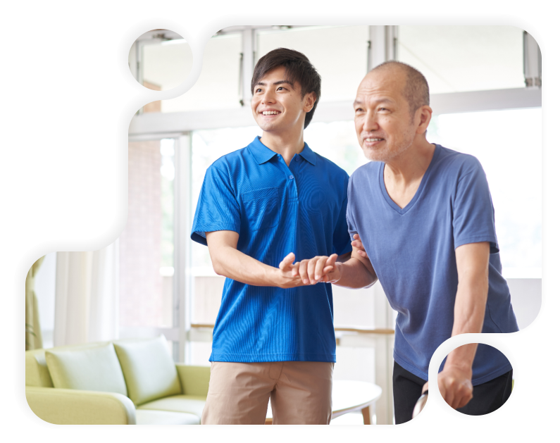 young caretaker helps the elderly man