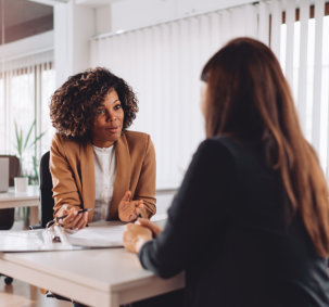 two woman talking