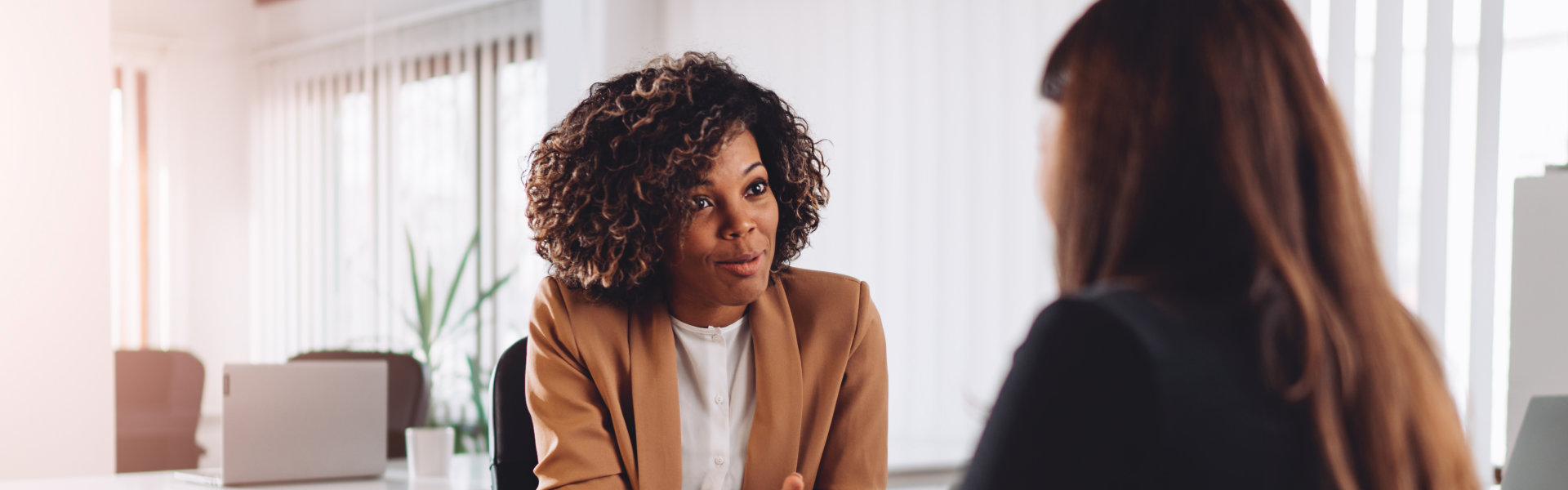 two woman talking